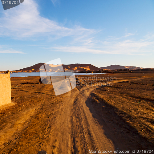 Image of sunshine in the lake yellow  desert of morocco sand and     dune