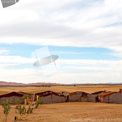 Image of tent in  the desert of morocco sahara and rock  stone    sky
