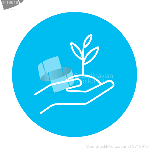 Image of Hands holding seedling in soil line icon.