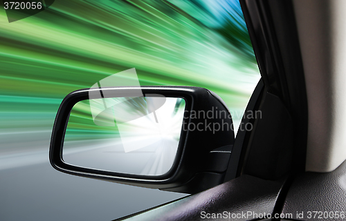 Image of rear-view of moving car