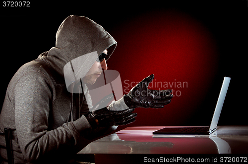 Image of Hacker with laptop