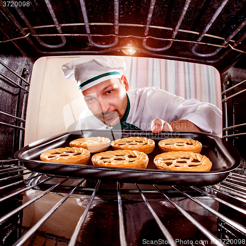 Image of Chef cooking in the oven.