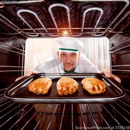 Image of Chef cooking in the oven.