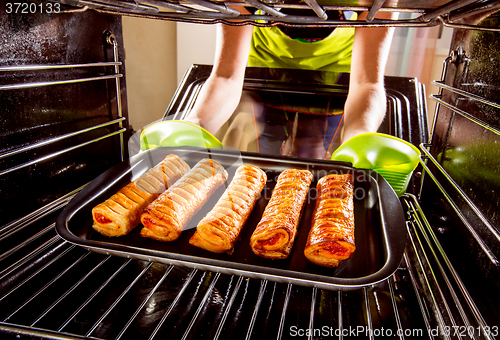 Image of Cooking in the oven at home.