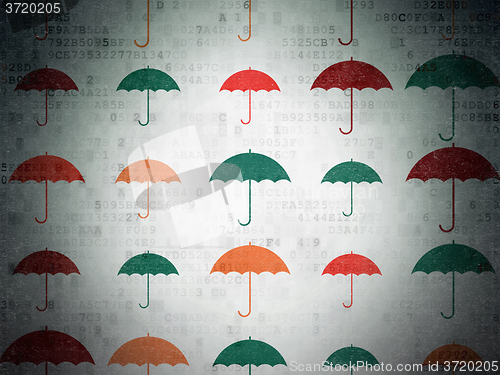 Image of Privacy concept: Umbrella icons on Digital Paper background