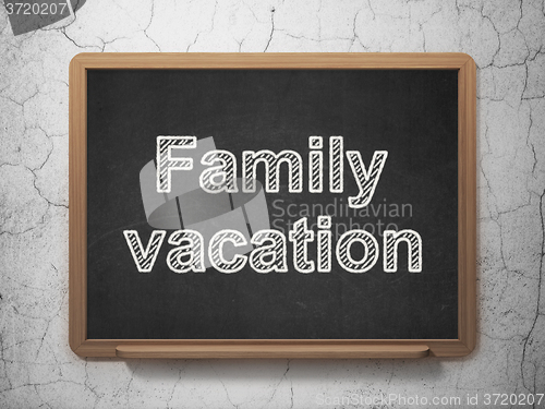 Image of Tourism concept: Family Vacation on chalkboard background