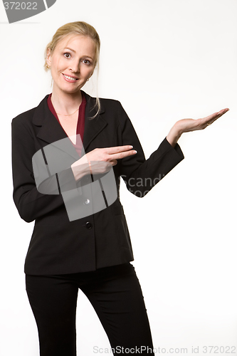 Image of Woman pointing and holding