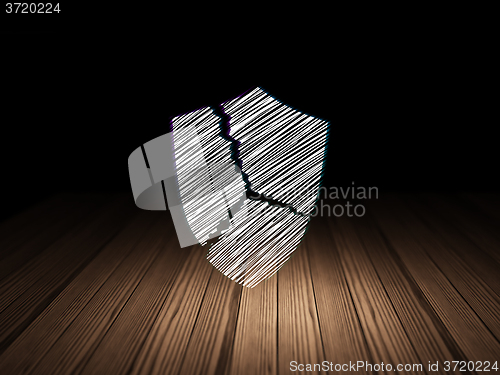 Image of Privacy concept: Broken Shield in grunge dark room