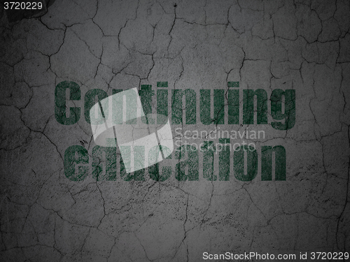 Image of Learning concept: Continuing Education on grunge wall background