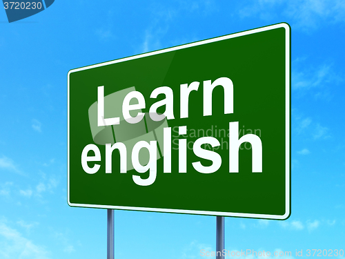 Image of Education concept: Learn English on road sign background