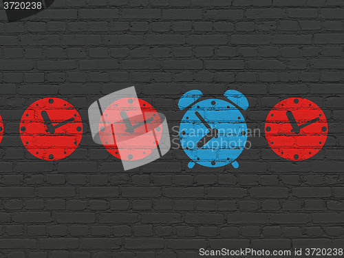 Image of Time concept: alarm clock icon on wall background