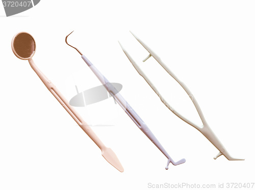 Image of  Dentist tools isolated vintage