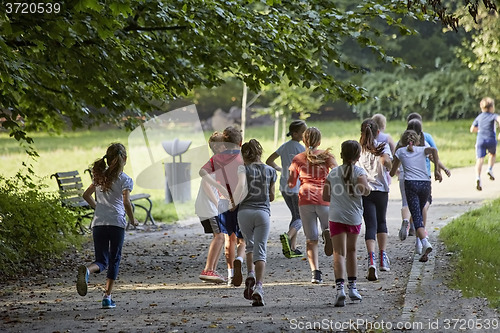 Image of Children running in park