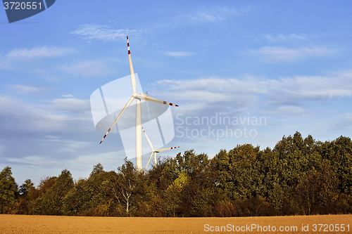 Image of Single windmill at dusk