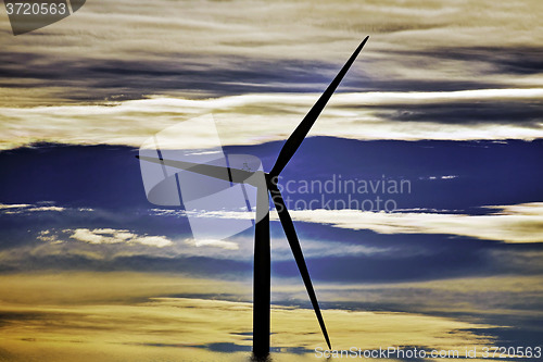 Image of Single windmill at dusk