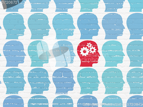 Image of Finance concept: head with gears icon on wall background