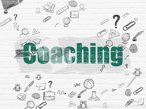 Image of Education concept: Coaching on wall background