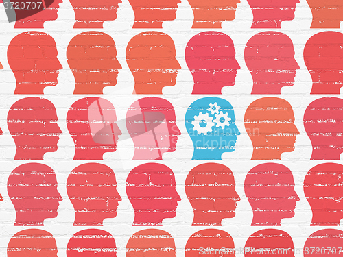 Image of Finance concept: head with gears icon on wall background