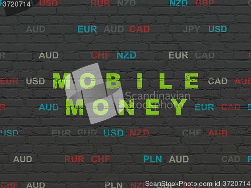 Image of Currency concept: Mobile Money on wall background