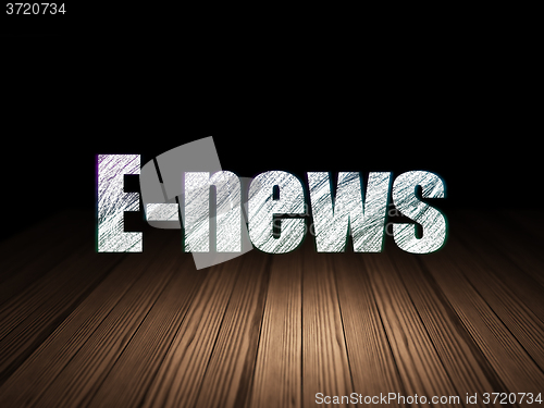 Image of News concept: E-news in grunge dark room
