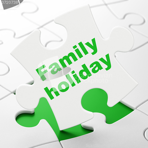 Image of Travel concept: Family Holiday on puzzle background
