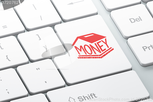 Image of Money concept: Money Box on computer keyboard background