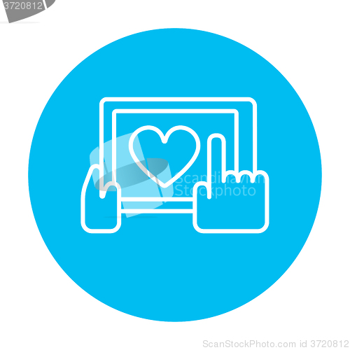 Image of Hands holding tablet with heart sign line icon.