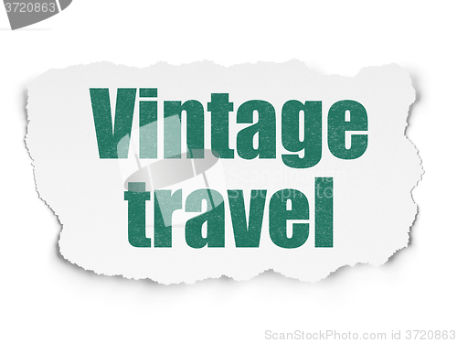 Image of Travel concept: Vintage Travel on Torn Paper background