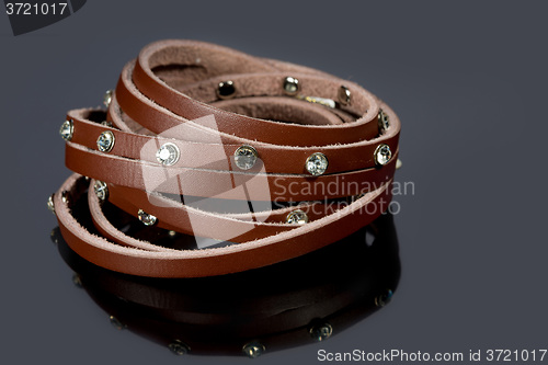 Image of leather bracelet with crystals