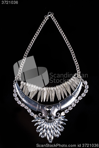 Image of metallic necklace in the form of feathers