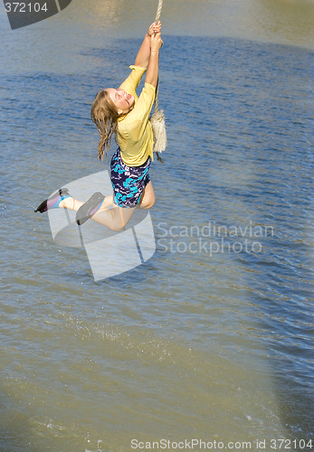 Image of girl swinging