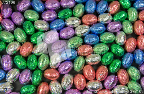 Image of collection of colourful easter eggs as background