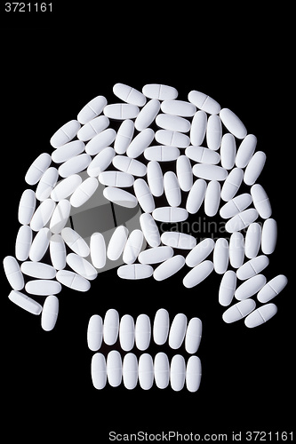 Image of face of white oblong tablets 