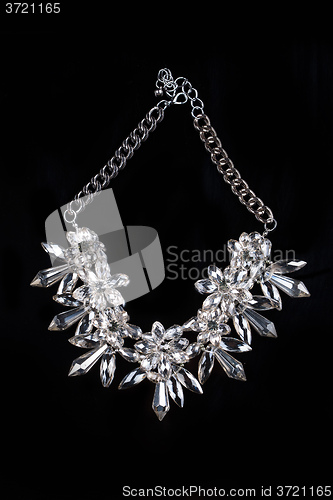 Image of luxury necklace on black stand