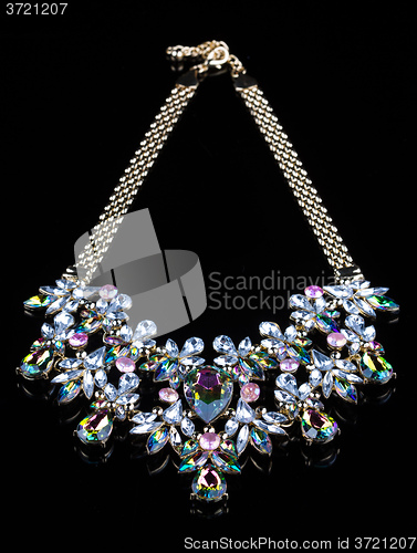 Image of luxury necklace on black stand