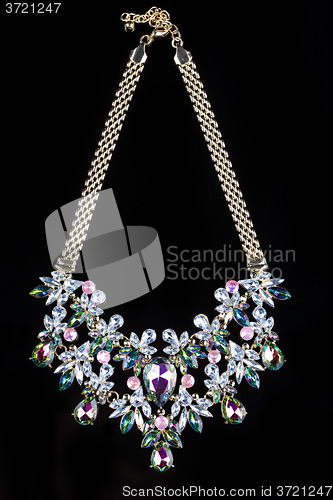 Image of luxury necklace on black stand