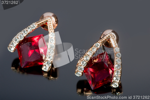 Image of Pear Diamonds Earrings. red gems