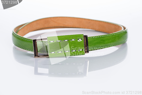 Image of thin green female belt buckle with fine