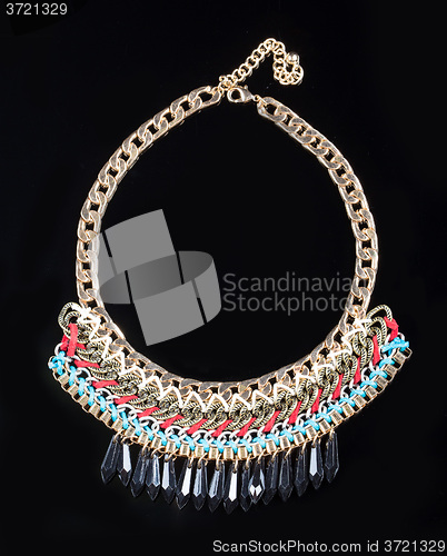 Image of luxury necklace on black stand