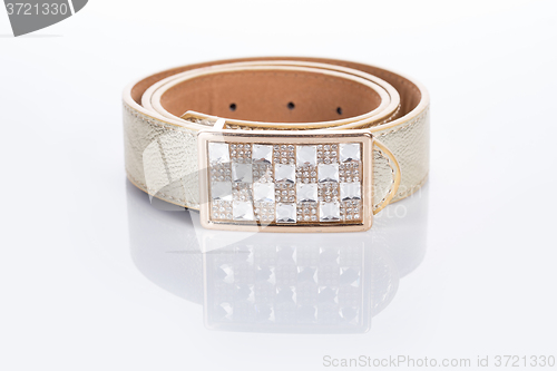 Image of beige leather Women\'s belt with rhinestones