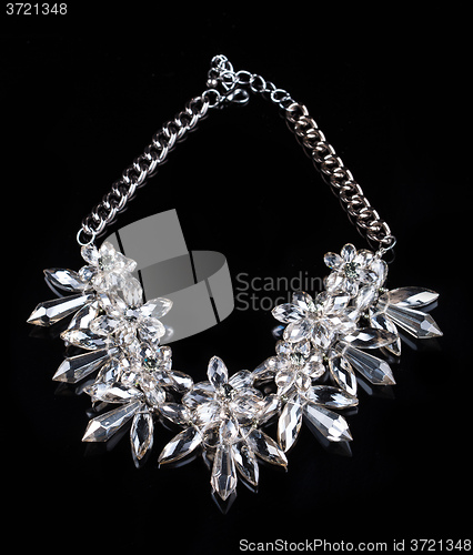 Image of luxury necklace on black stand