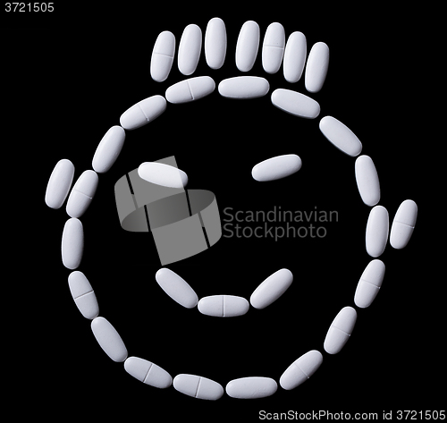 Image of face of white oblong tablets 