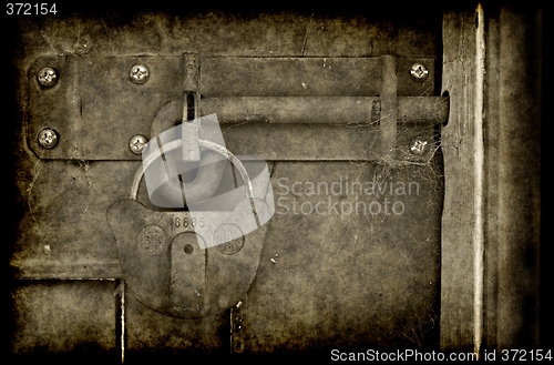 Image of old locked door