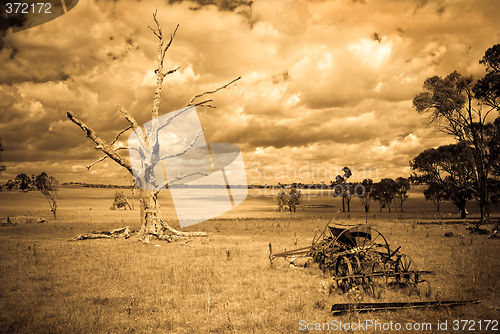 Image of storm brewing - old farm photo