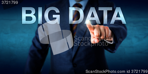 Image of Manager Selecting BIG DATA On A Screen