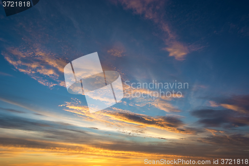 Image of Beautiful sunset with dramatic clouds.