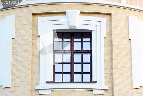 Image of Beautiful window on the brick wall.