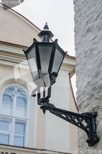 Image of Beautiful lantern on a wall of the house in Tallinn