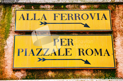 Image of Alla Ferrovia and Piazzale Roma direction sign in Venice