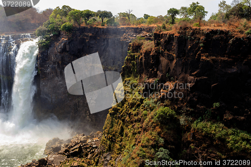 Image of The Victoria falls with mist from water